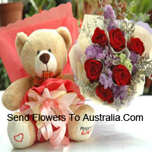 Beautiful Teddy with Lovely 7 Roses