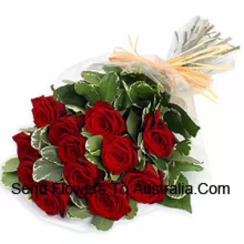 A Beautiful Bunch Of 11 Red Roses With Seasonal Fillers