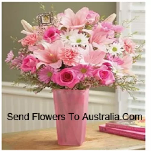 Pink Roses, Pink Carnations, Pink Gerberas, White Gerberas And Pink Lilies With Seasonal Fillers In A Glass Vase