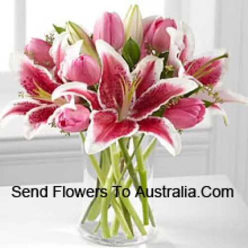 Pink Lilies And Pink Tulips In A Glass Vase